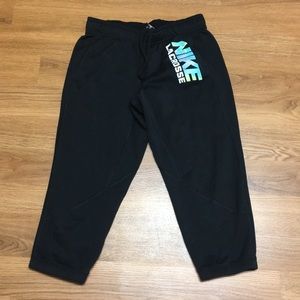 Mid calve Nike Lacrosse sweat pants.